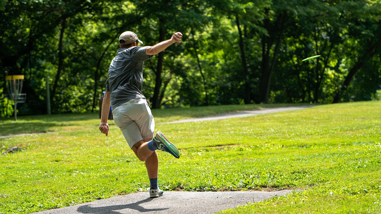 Disc golfer on course